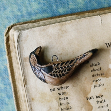 tribal folk bird charm