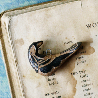 tribal folk bird charm