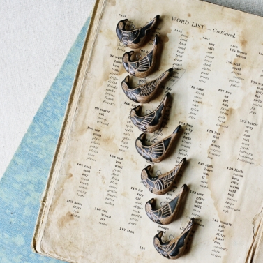 tribal folk bird charms