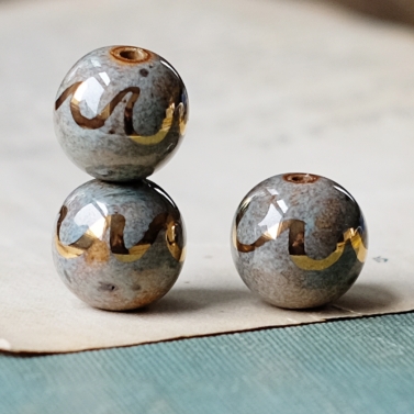 gold luster waves bead 