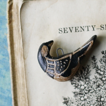 tribal folk bird charm